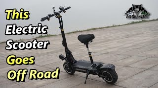 DuoTork Electric Kick Scooter off Road wet grass Steep Climb