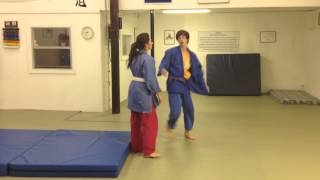 Judo girl throws guy