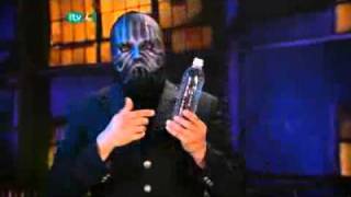 Masked Magician Cell phone through the plastic bottle