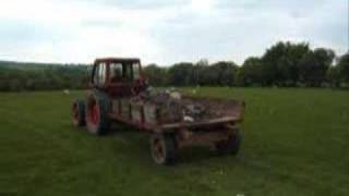 SAME Saturno 80 4WD Tractor pulling Massey-Ferguson Trailer