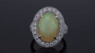 Large Gleaming Opal Center Stone Diamond Halo Split Shank with Baguette & Round Diamond