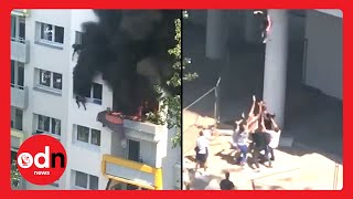 Heart-Stopping Moment Children Jump From Third Floor Window to Escape Apartment Fire