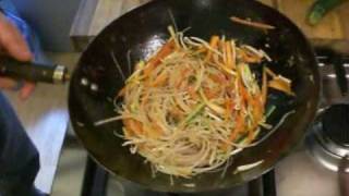 Stir frying rice noodles