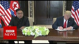 Kim Jong-Un and Donald Trump sign a "historic" document - BBC News
