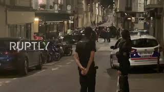 France: Police cordon off Paris street after car crashes into cafe, leaves one dead