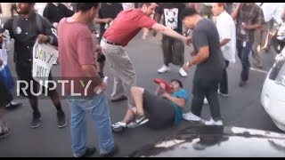 USA: Man wearing pro-Trump cap evicted from anti-police violence protest