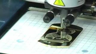 Personalizing a Pendant with a Roland MPX-90 Impact Printer