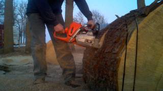 Husqvarna 562xp chainsaw pulling a 36" bar