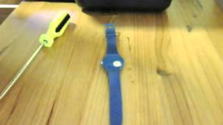 Replace a Swatch Watch battery using a Flat Screwdriver