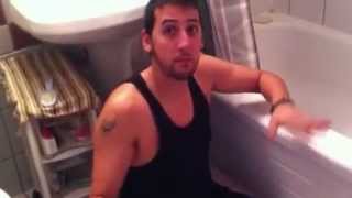 Bilateral amputee above the knee without legs in a washroom