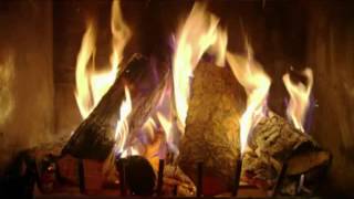 Open haard met Kerstmuziek