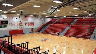 "Get Ready For This" playing in a high school gymnasium