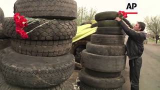 At least 1 killed, 3 injured as pro-Russian gunmen clash with an armed group
