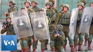 Palestinians Clash with Israeli Forces in Hebron over Trump's Peace Plan