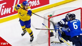 Sweden's Nils Hoglander pulls off a perfect lacrosse goal