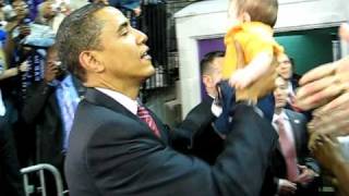 Barack holding Afghan baby:)