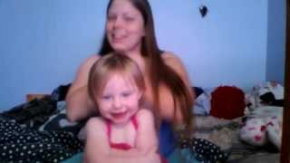 Mother and Daughter Blows kiss's and hugs.
