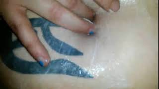 Sexy belly button gets lotioned