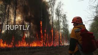 Russia: Firefighters blast soil to stop Yakutia wildfires