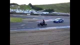 Evo 10 vs. Triumph Rocket 3 drag race