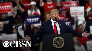 Watch live: Trump holds rally in New Hampshire a day before the primary