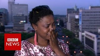 Mugabe resigns: activist breaks down in tears of Joy  - BBC News