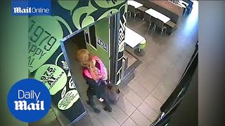 Man in LBD and fishnet stockings robs fast food shop - Daily Mail