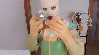 Rubber medical attire in green, white and transparent