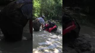 2014 Honda foreman 500 on 28 inch outlaw 2s mudding deep
