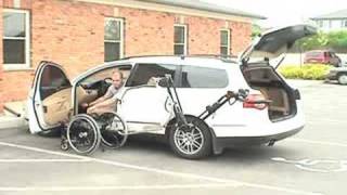 robot 2001 arm putting wheelchair into VW passat