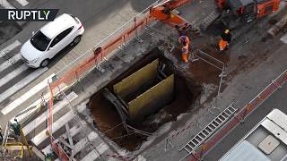 RAW: Massive 5-meter crater opens in Rome city center