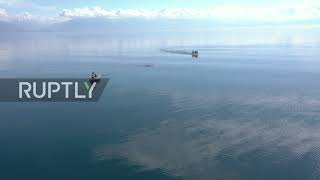 Courageous swimmers brave cold waters during first international ecological swim on Lake Baikal