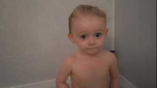Pointing out her nose, eyes, mouth and belly button too!