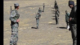China says India building up troops amid border stand off
