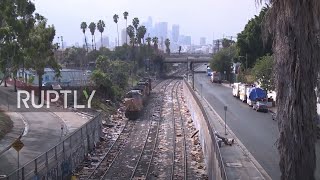 USA: Rail robberies leave LA train tracks covered in litter