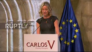 Spain: Merkel says 'very hard work' ahead for EU to achieve climate goals in award ceremony