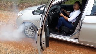 Cars stuck girl in the mud, high heel boots tires hard spinning, revving girl - pedal pumping