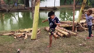Girl Kicking a Banana Tree