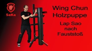 Wing Chun Holzpuppe: Lap Sao nach Fauststoß