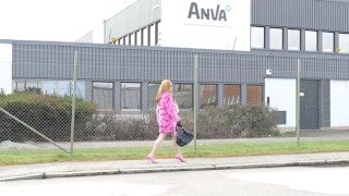 Crossdresser in Pink high heels pumps and pink fur coat