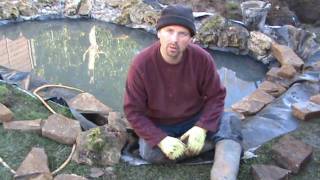 How to Build a Fish Pond Part 3 - Installing the Edging, Pump and Filter