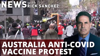 Riot police crack down on Australian protesters over vaccines