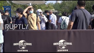 China: Invite-only guests line up outside brand new Universal Studios Resort in Beijing
