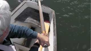 Sculling over the Stern