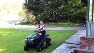 mom mowing in skirt