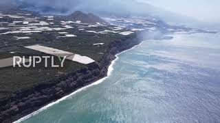 Spain: La Palma volcano lava forms 500-metre delta as it crashes into sea *AERIAL FOOTAGE*