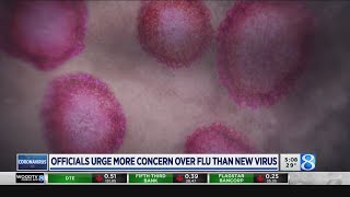 Officials urge more concern over flu than new virus