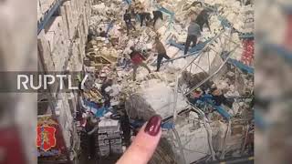 Russia: Krasnoyarsk warehouse worker buried under massive stacks of alcohol