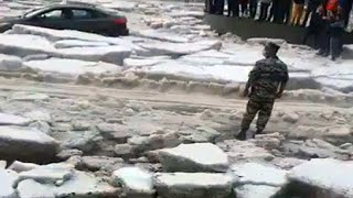 Look at the effects of global warming! In Armenia, icy rivers carry cars away!