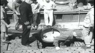 Admiral Robert M Griffen and others aboard captured Japanese submarine. HD Stock Footage